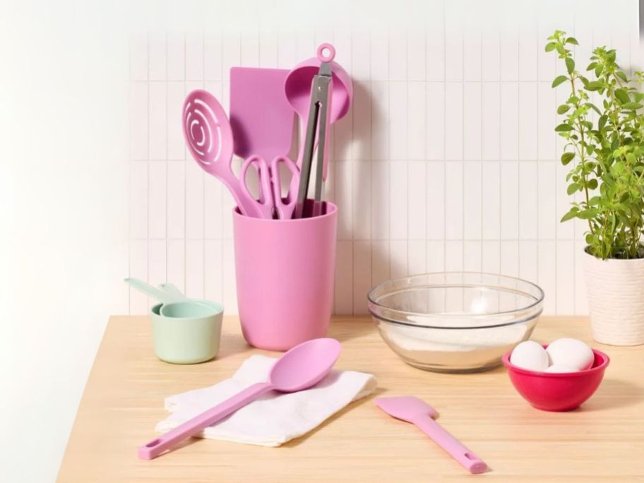 pink Room Essentials 8-Piece Nylon Kitchen Utensil Set w/ Holder on counter