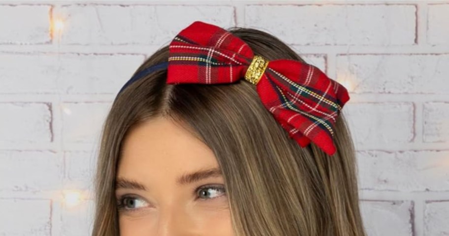 woman wearing a scunci tartan headband
