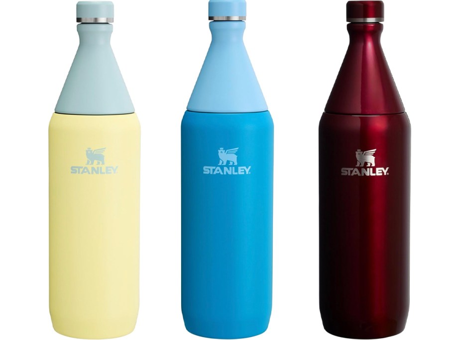 yellow, blue, and red stanley water bottle