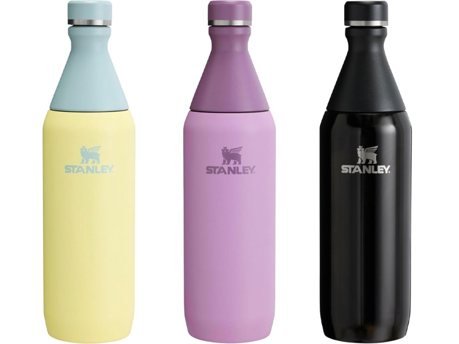 yellow, purple, and black water bottles