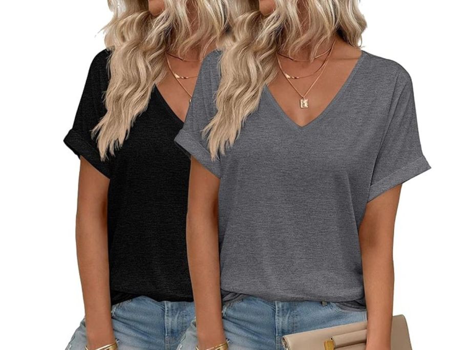 two women wearing a black and grey tee