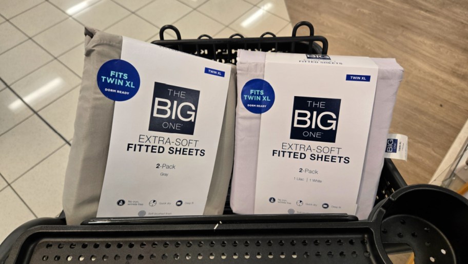 two packages of kohls the big one fitted sheets in a store cart