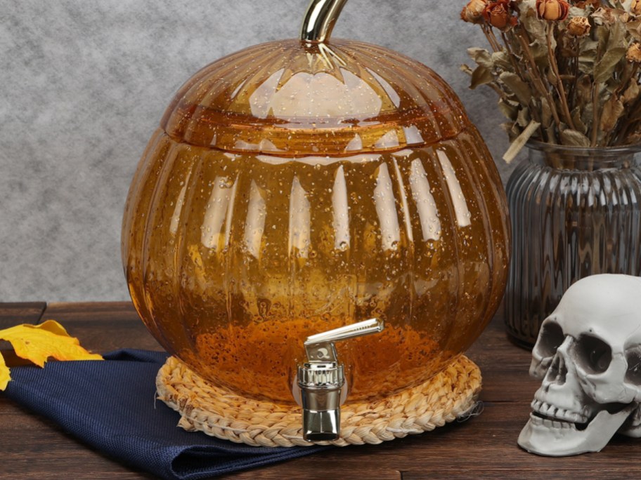 orange pumpkin drink dispenser
