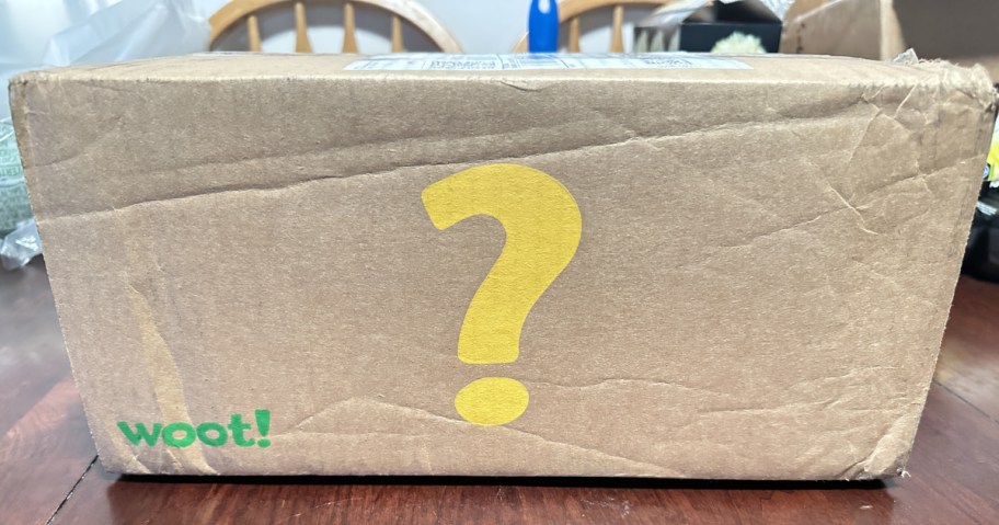 cardboard box with yellow question mark