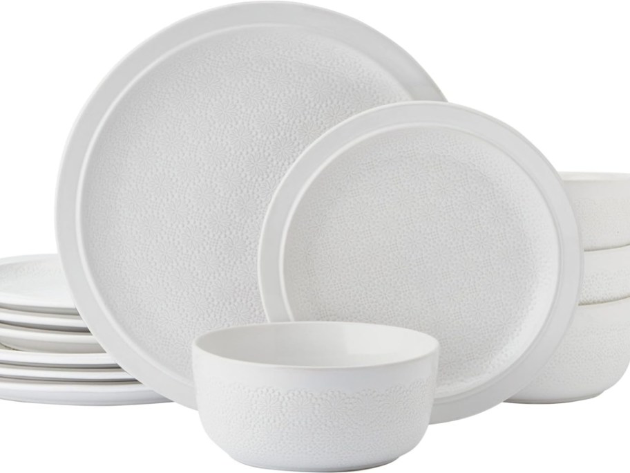 a set of white dinnerware plates and bowls