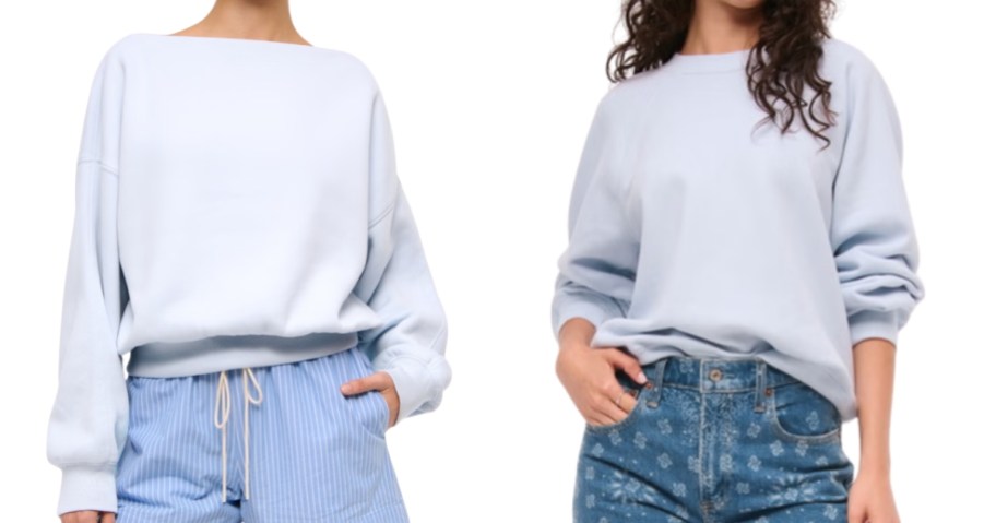 two women wearing light blue sweatshirts in different styles and jeans