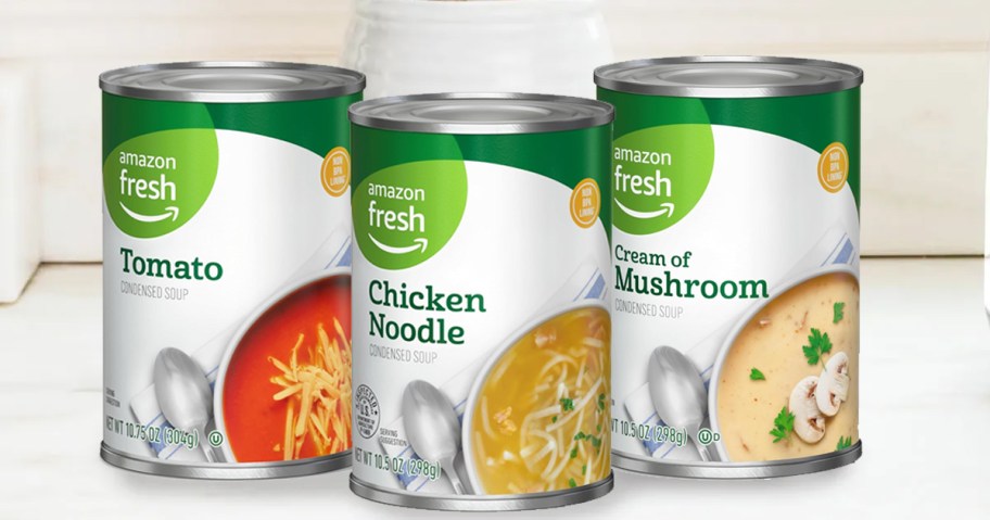three cans of Amazon Fresh Soups on counter