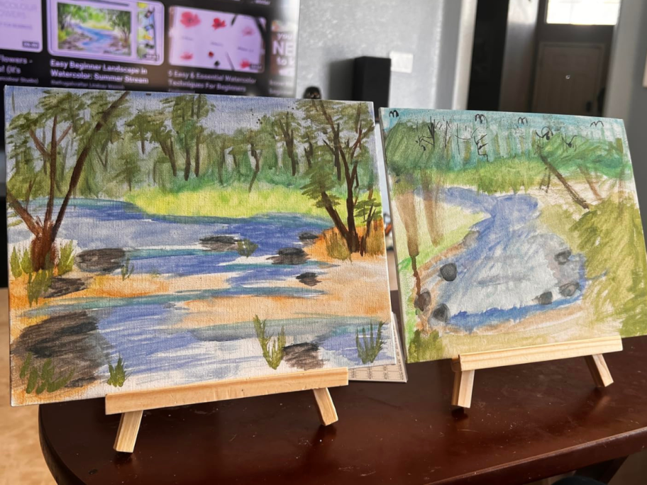 2 paintings of streams on canvas