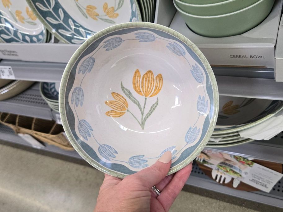 Better Homes & Gardens Bamboo Melamine Floral Cereal Bowl in hand in store