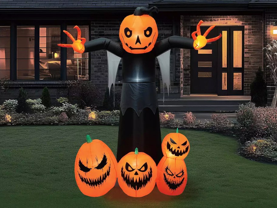 pumpkin reaper inflatable in front yard