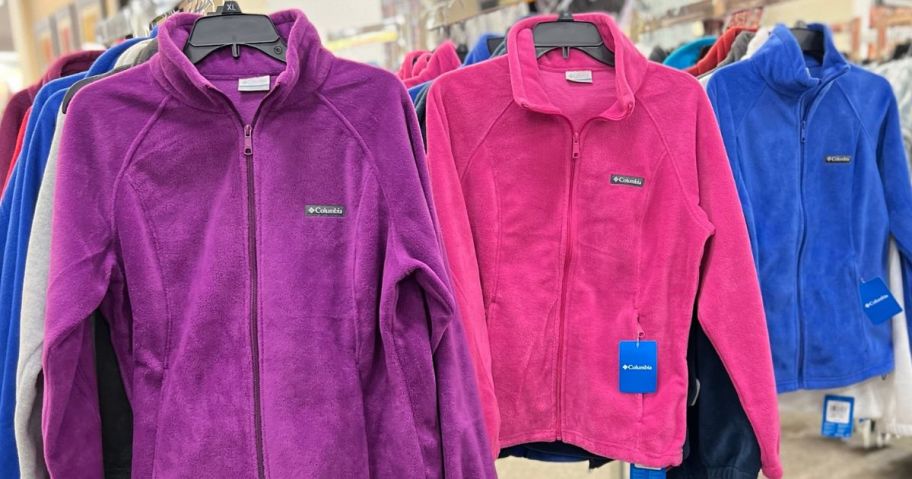 Columbia Fleece Jackets for women on hangers in purple, pink and blue