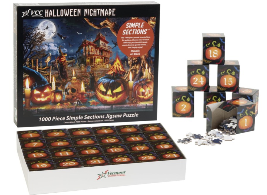 Vermont Christmas Company Halloween Nightmare 1000-piece jigsaw puzzle box with twenty-four numbered section boxes and puzzle pieces spilled out.