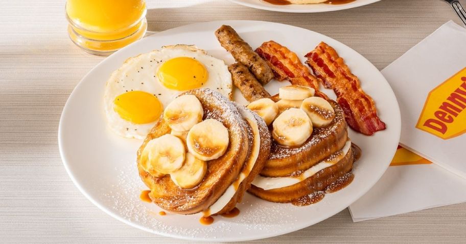 Salted Caramel Banana French Toast, bacon, sausage, and eggs on a plate
