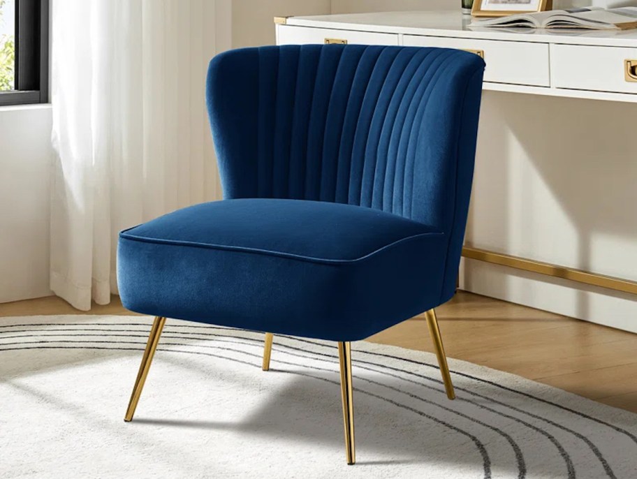 navy blue accent chair with white desk