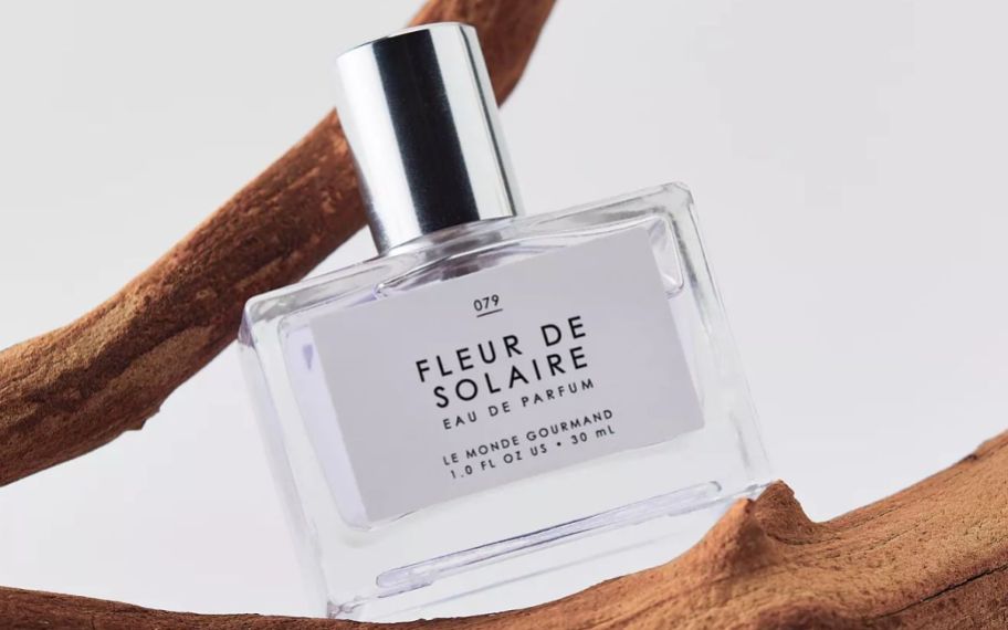 Fleur de Solaire perfume on a branch