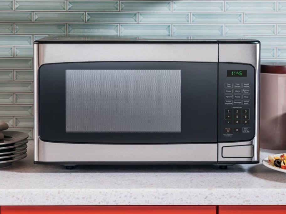GE 1.1 cu. ft. Capacity Countertop Microwave Oven on kitchen counter
