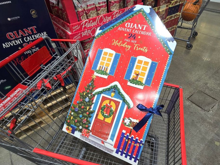 Giant advent calendar inside of a store shopping cart
