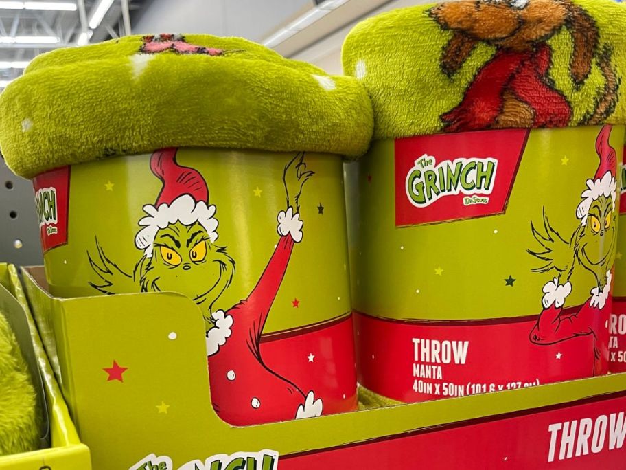 Grinch throw displayed at the store