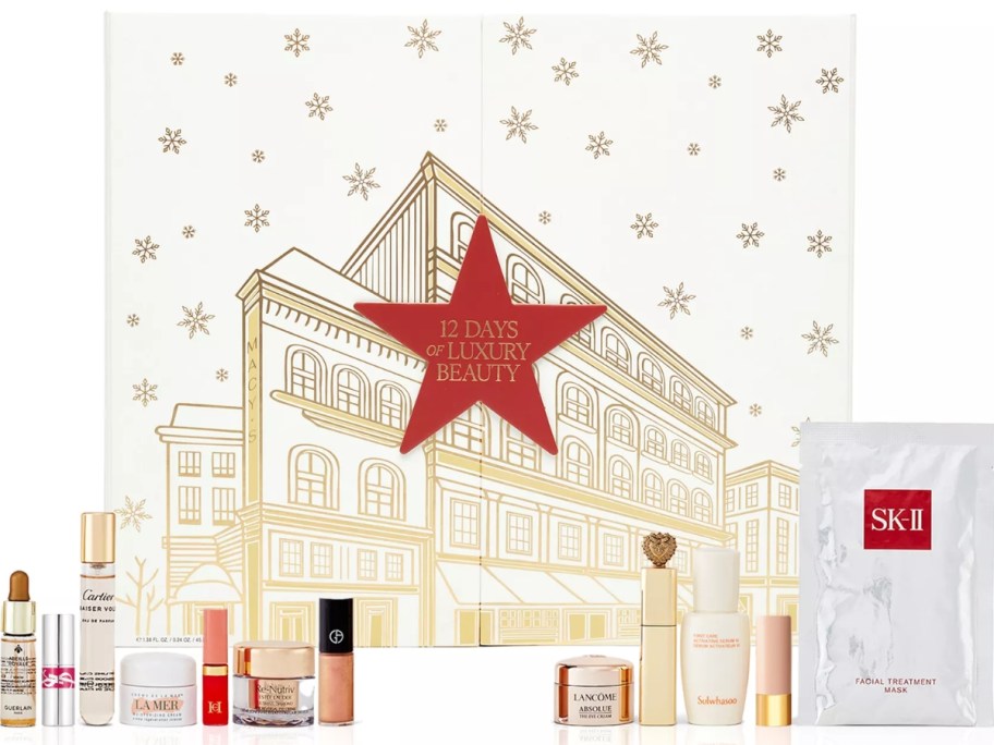 an advent calendar box with a Macy's store image on it, beauty products standing in front of it