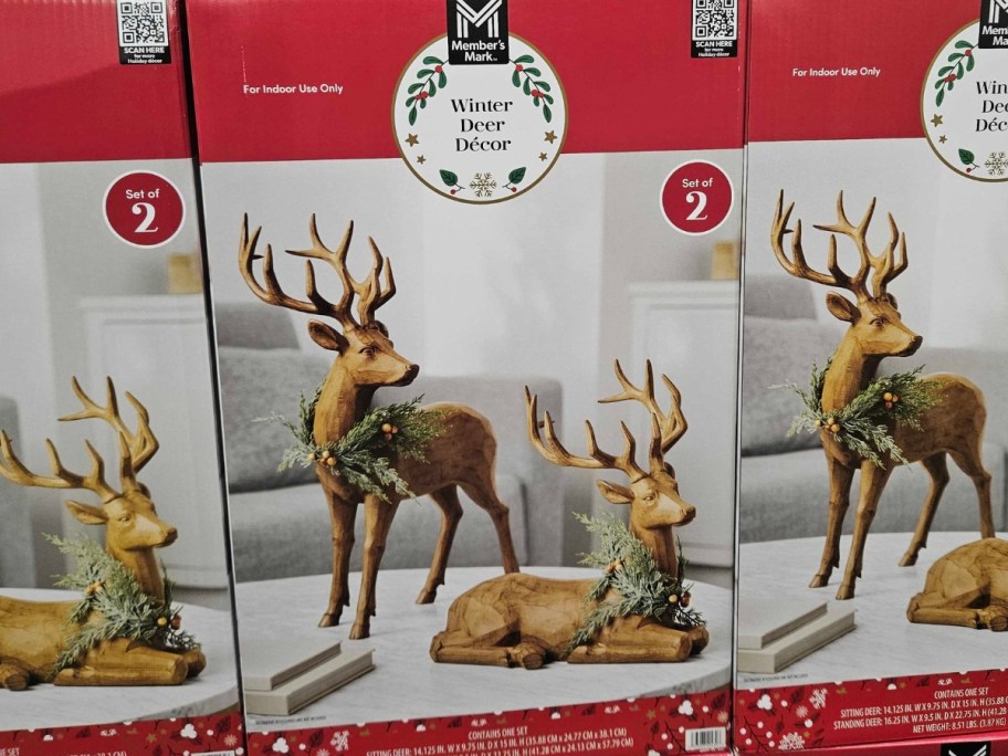 boxes with wooden winter deer figures