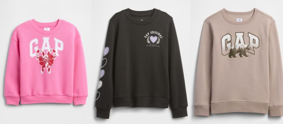 a baby and 2 kids GAP sweatshirts