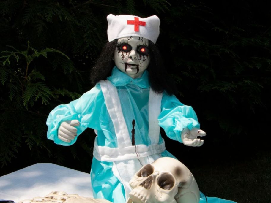 Groundbreaker Zombie Nurse in blue with a nurse hat