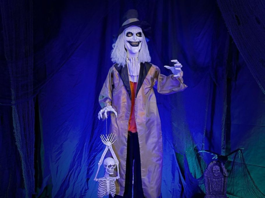 creepy Gravekeeper with skeleton