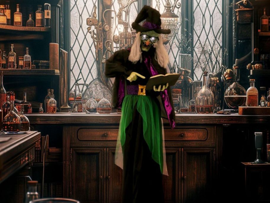 a creepy witch figure with glowing eyes reading a book