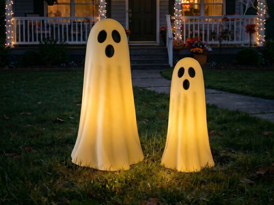 Haunted Living 2-Count Lighted Ghosts on front lawn