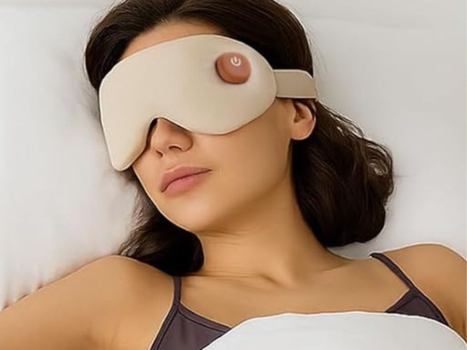 woman wearing a cordless heated eye mask