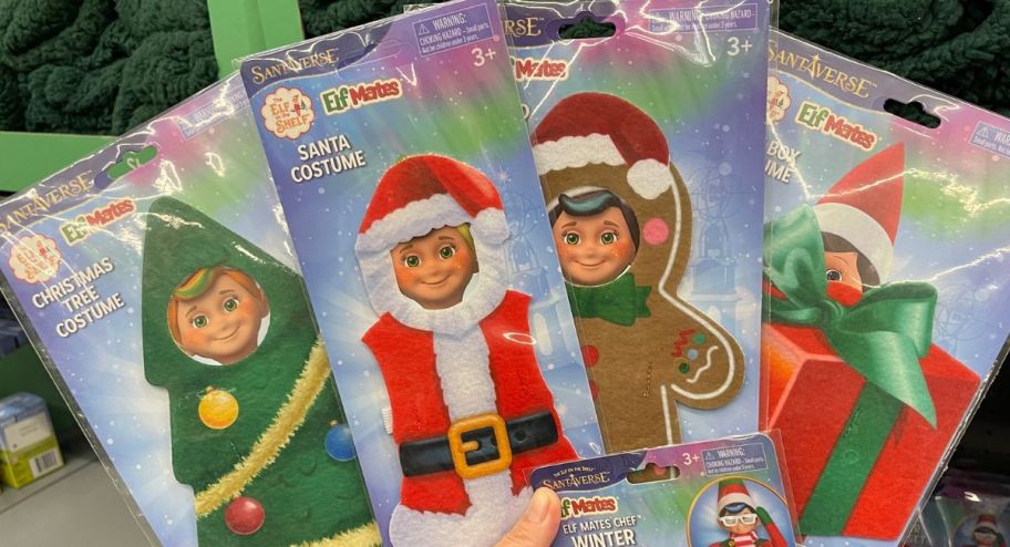 hand holding different Holiday Time Elf costume 