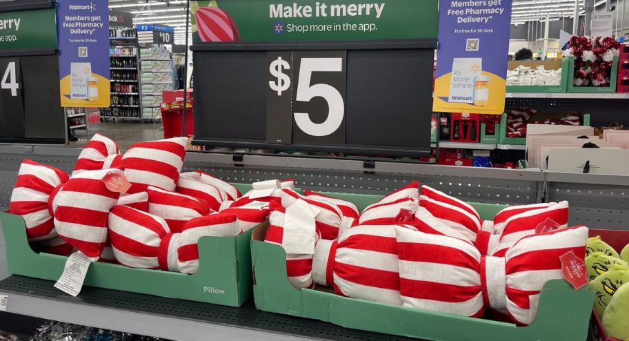 display of Holiday Time Red and White Bow Pillow 