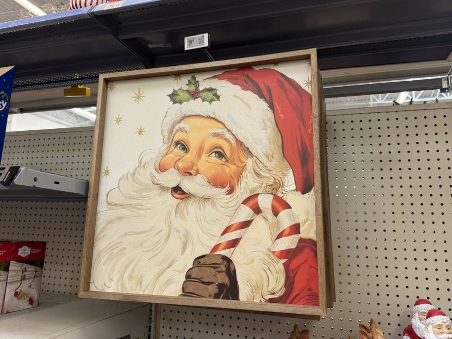 Holiday time santa frame hanging at the store with price