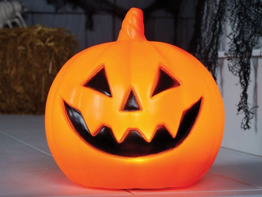 orange pumpkin on top of the table