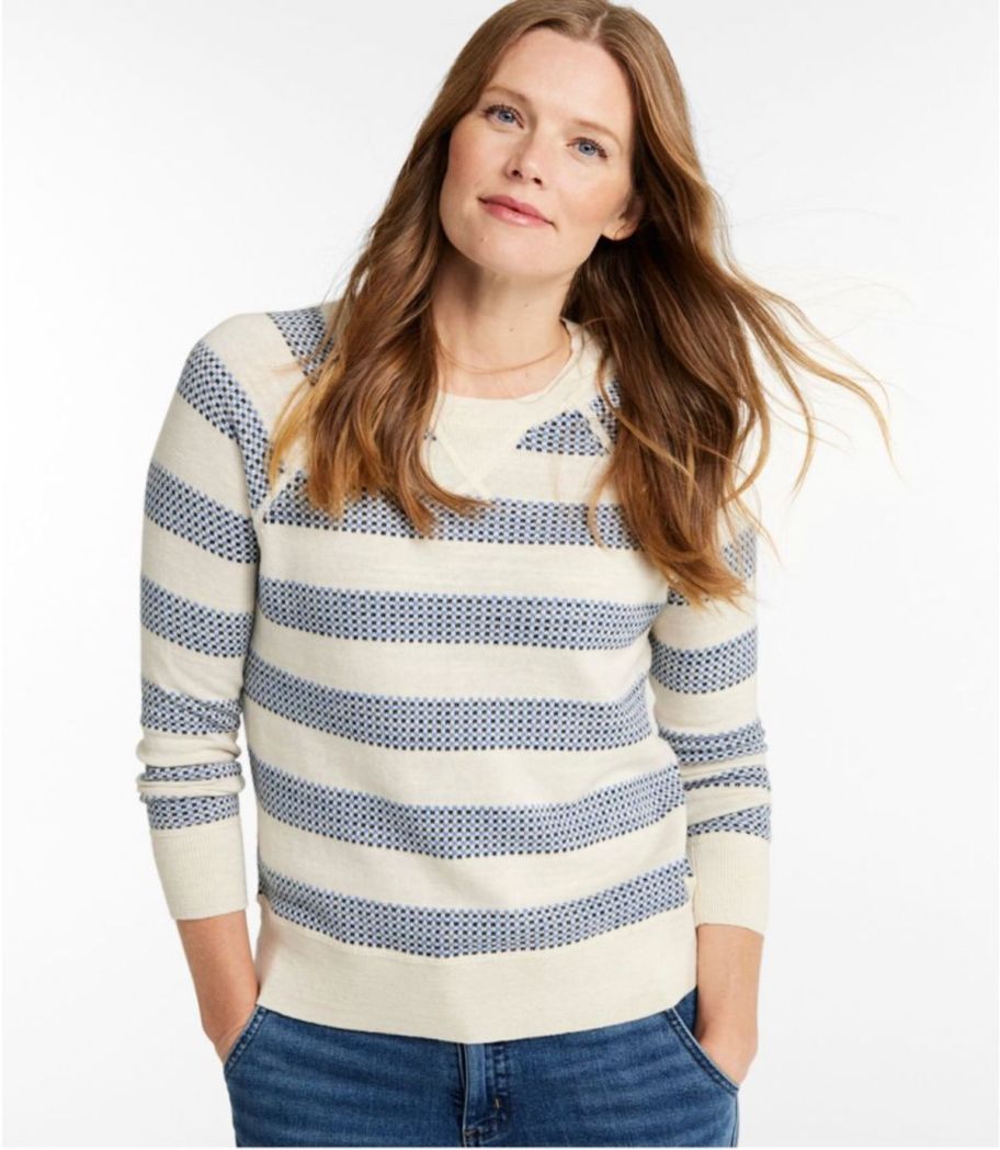 woman modeling blue and white stripe sweater