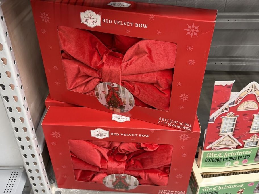 Holiday time Large red velvet bow displayed at the store