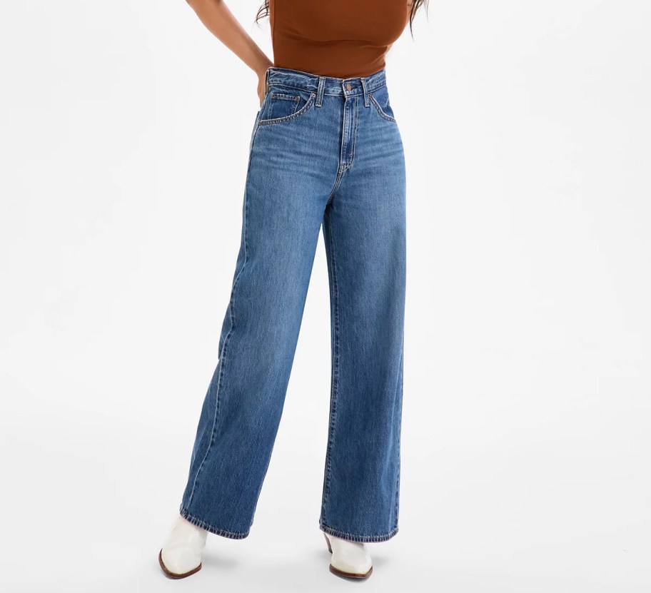 stock photo of women wearing denim jeans