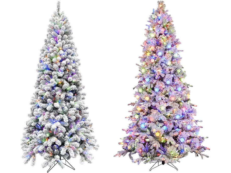 two white flocked pre-lit christmas trees