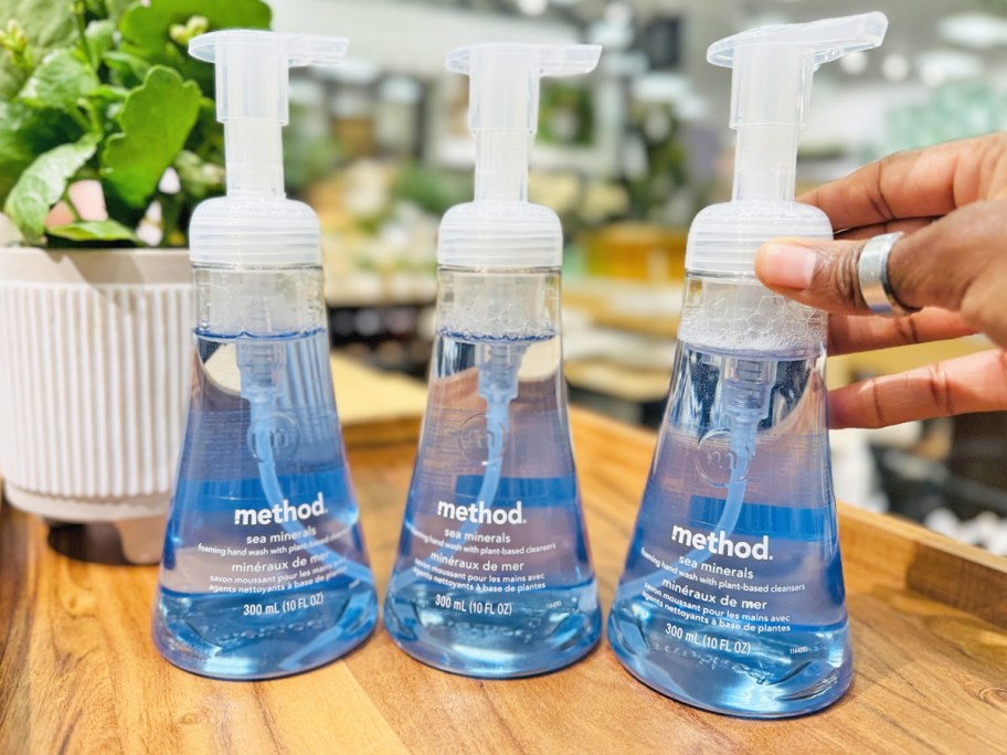 three blue bottles of Method Foaming Hand Soap
