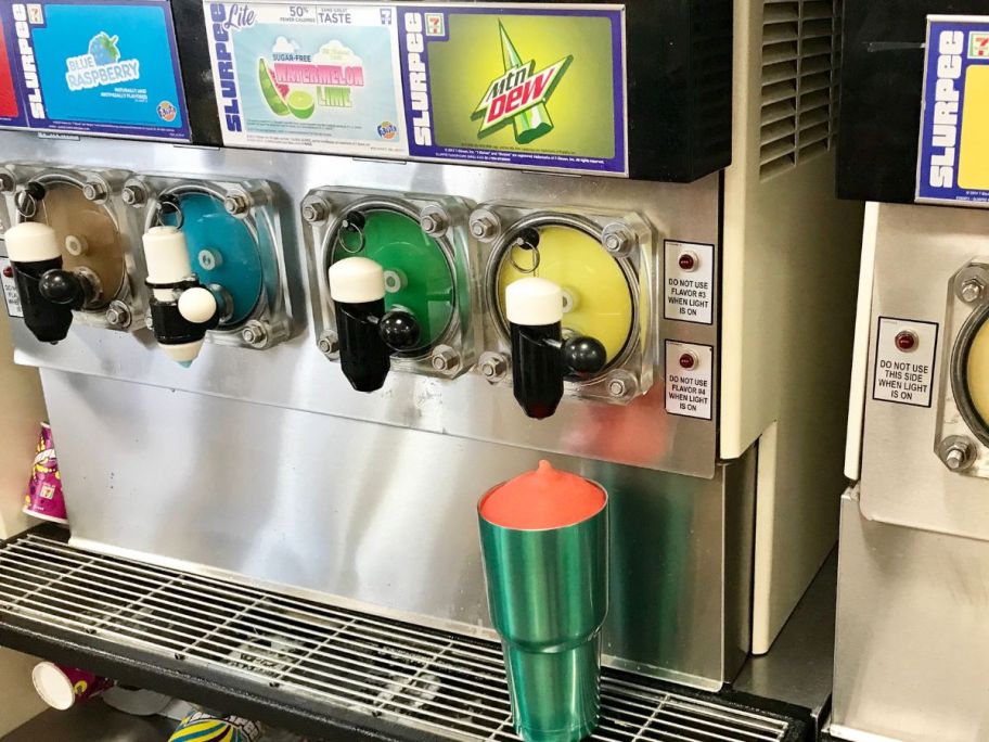 Surpee Machine at 7-Eleven with a huge tumbler filled with Slurpee