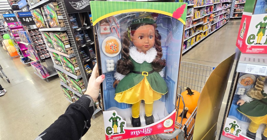 hand holding up a My Life As Elf Doll in store