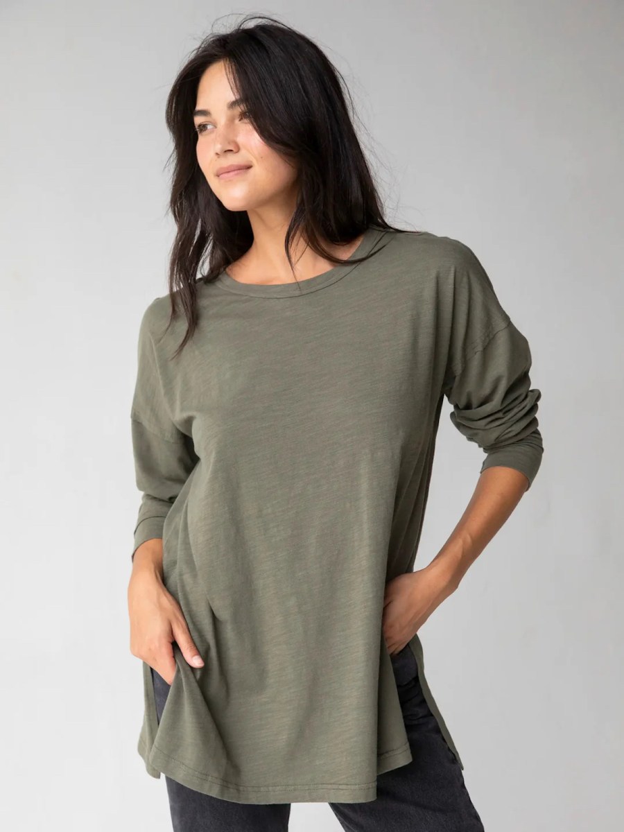 woman modeling long green tshirt