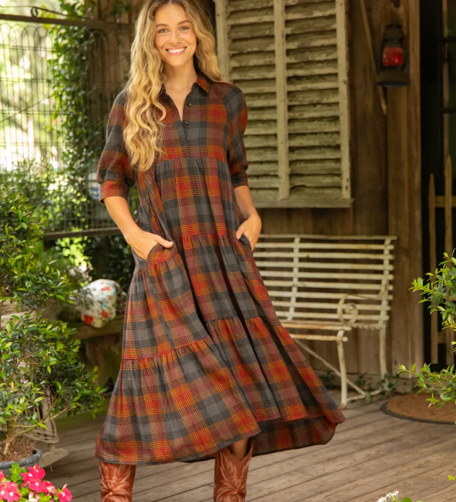 woman modeling cotton flannel dress outside