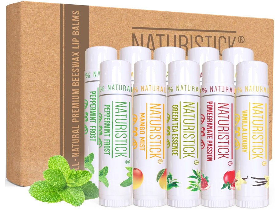 multiple tubes of lip balm in front of a cardboard box