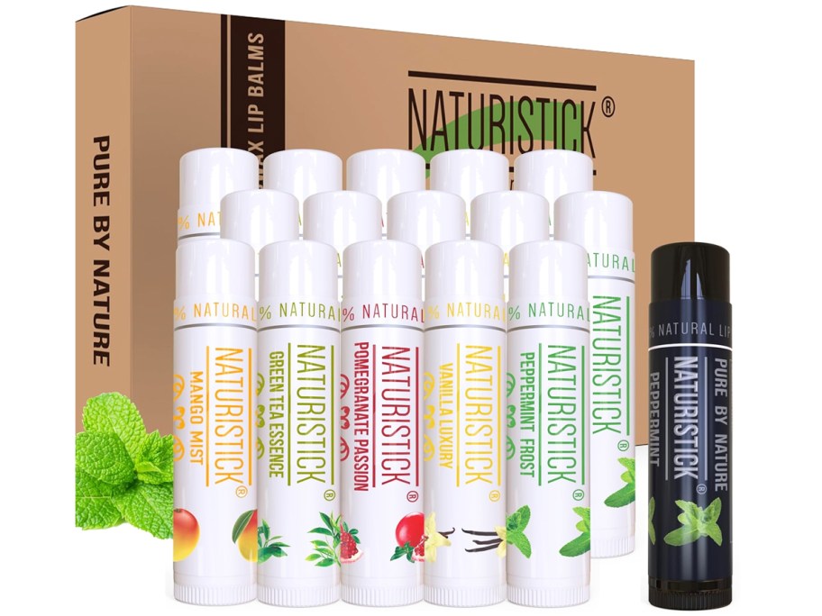 multiple tubes of lip balm in front of a cardboard box