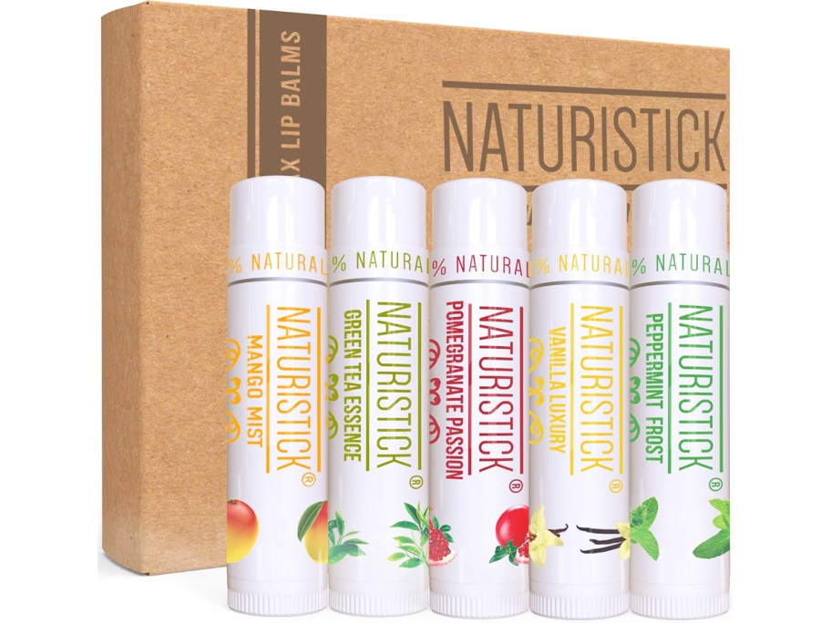 5 tubes of lip balm in front of a cardboard box