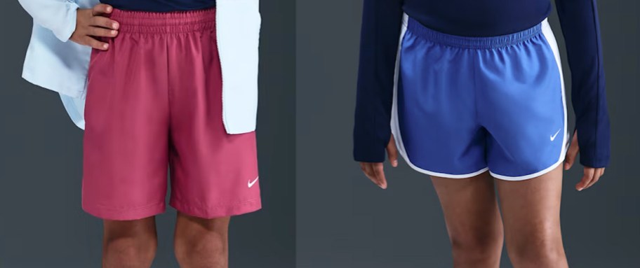 two kids in red and blue shorts