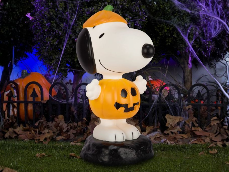 Peanuts 2' Peanuts Lighted Snoopy Pumpkin Blow Mold on display