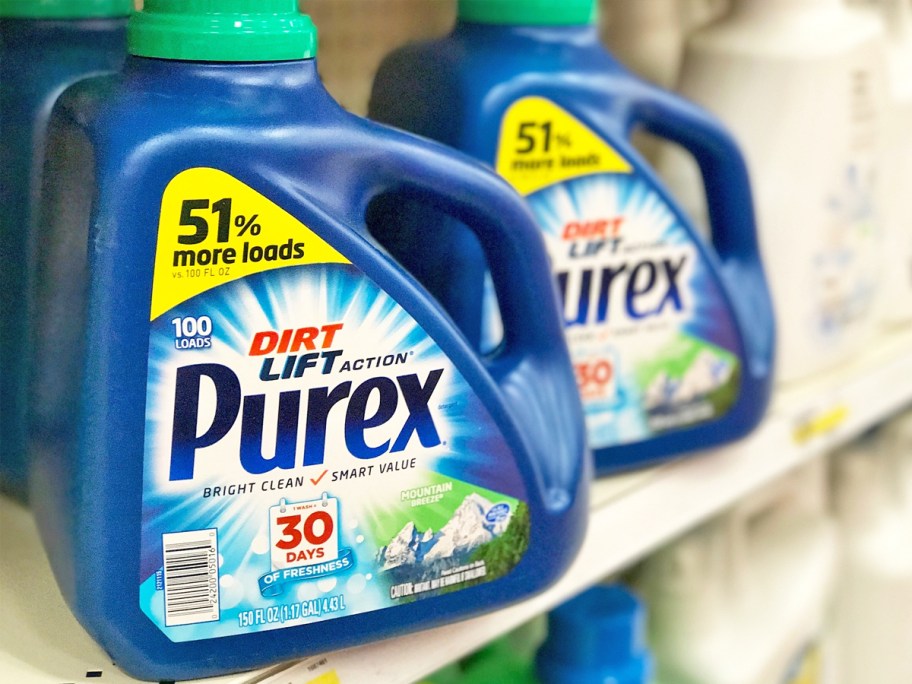 large blue bottles of Purex Laundry Detergent on store shelf