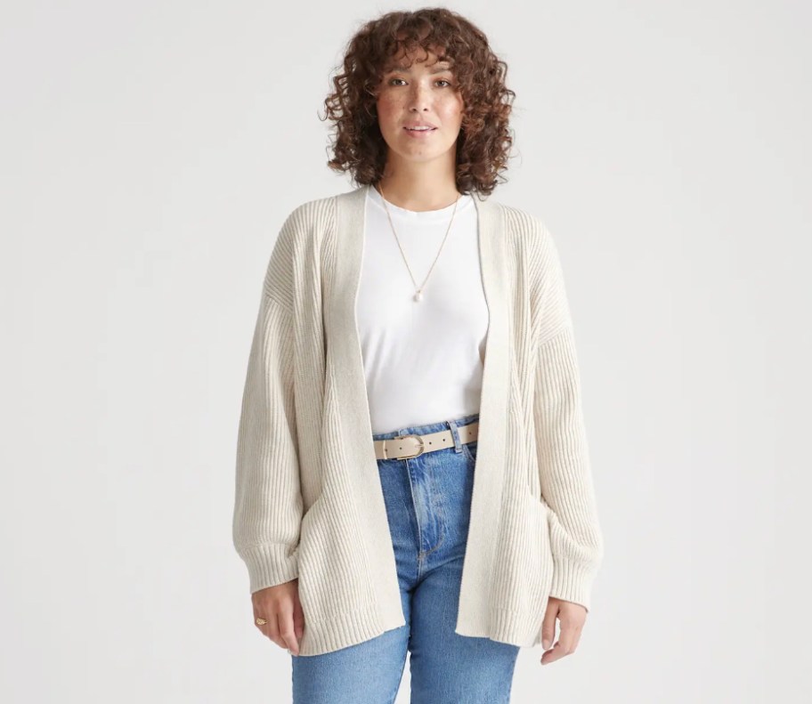 woman wearing cream cardigan